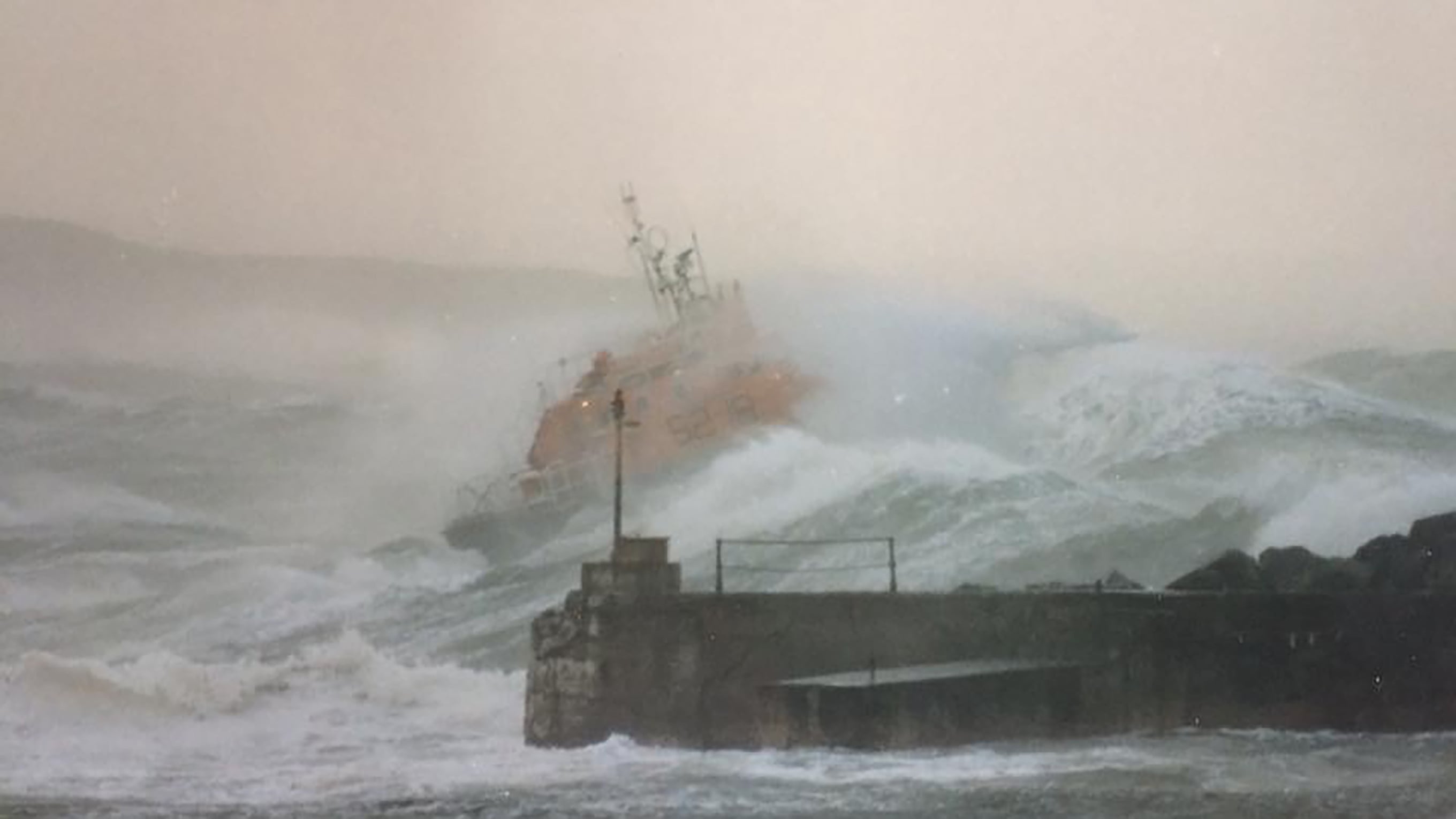 Portrush Arun class lifeboat Richard Evans, heading out to sea in February 1989