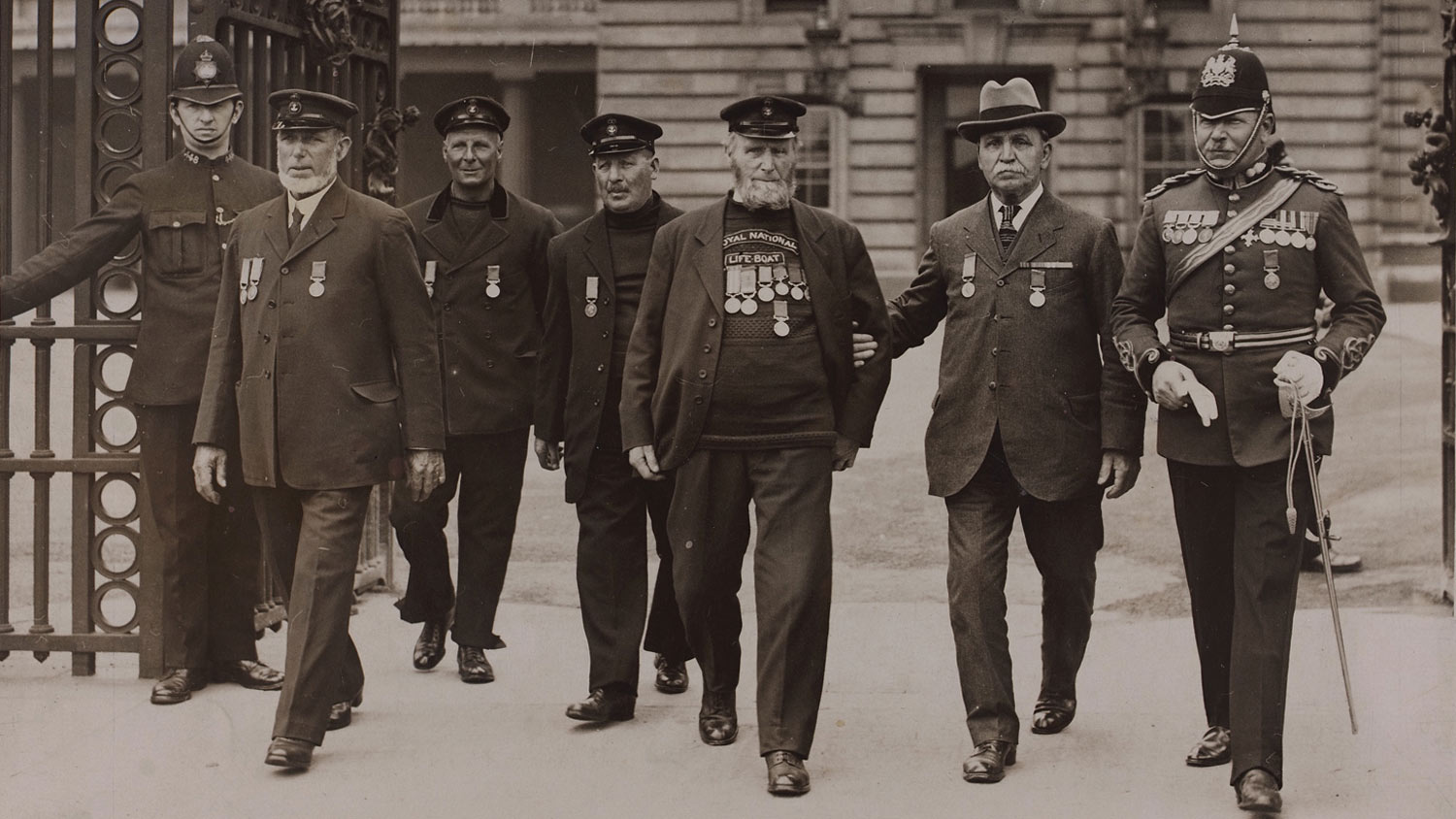 Henry Blogg and other RNLI medallists leave a ceremony in London celebrating 100 years of the RNLI