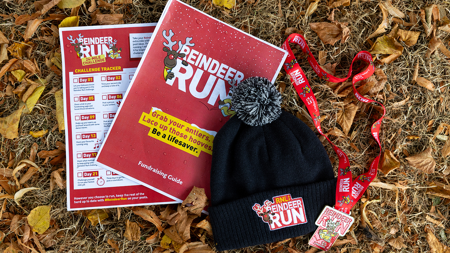 A Reindeer Run fundraising guide, tracker, beanie and medal. 