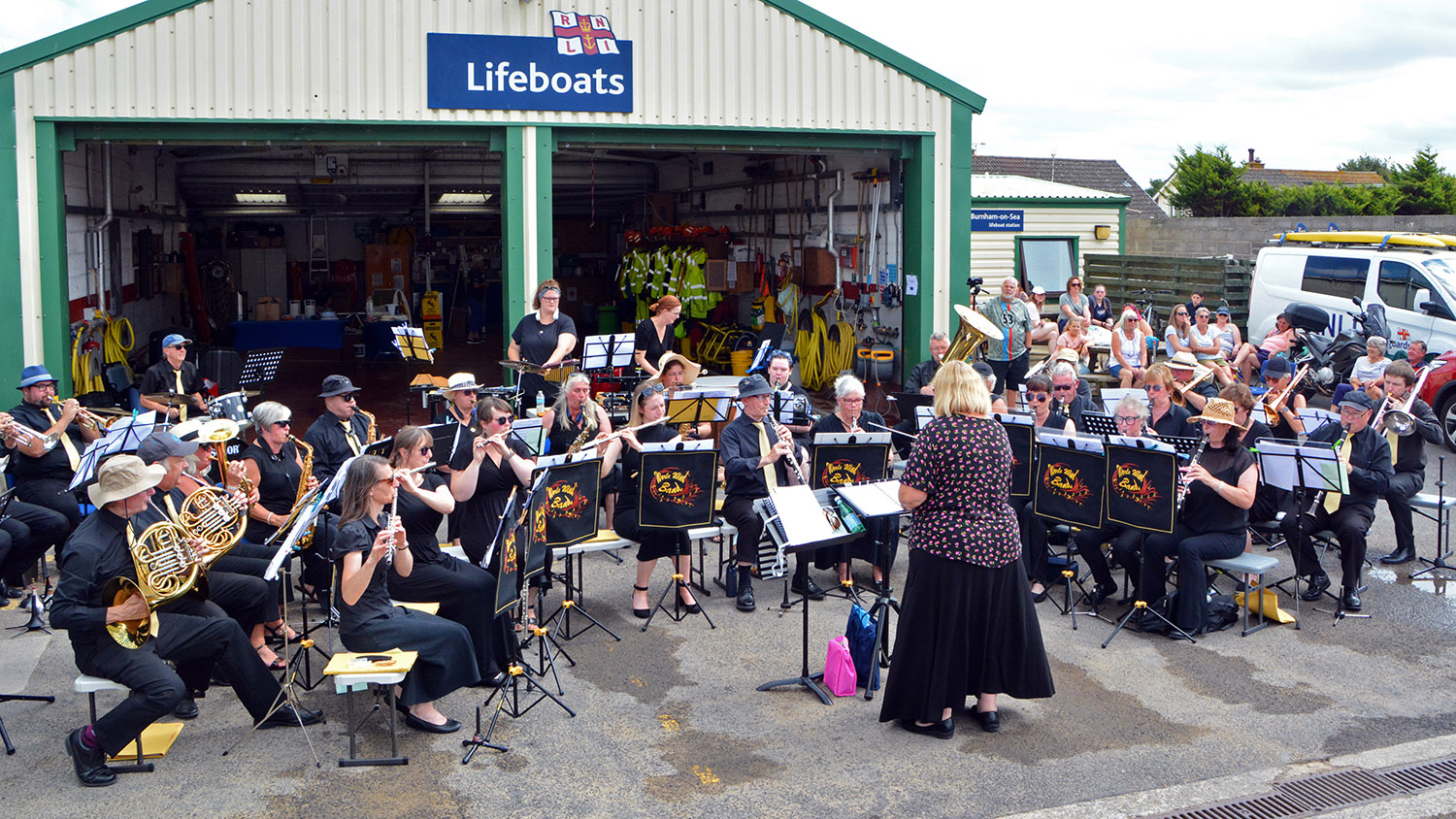 The Worlewind Band playing in front of the lifeboat station.