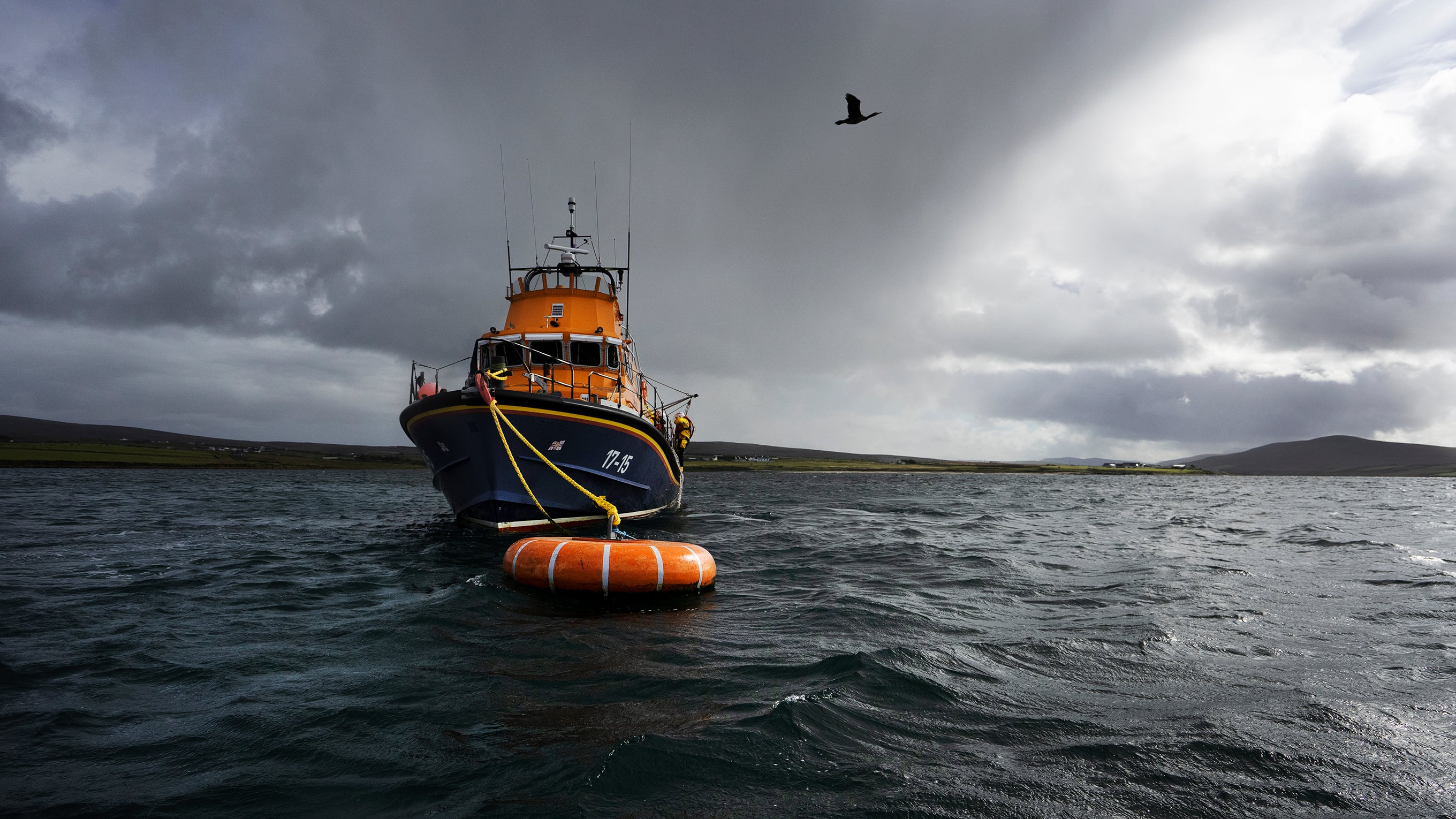 Ballyglass’s Severn class lifeboat, attached to an orange mooring buoy. 