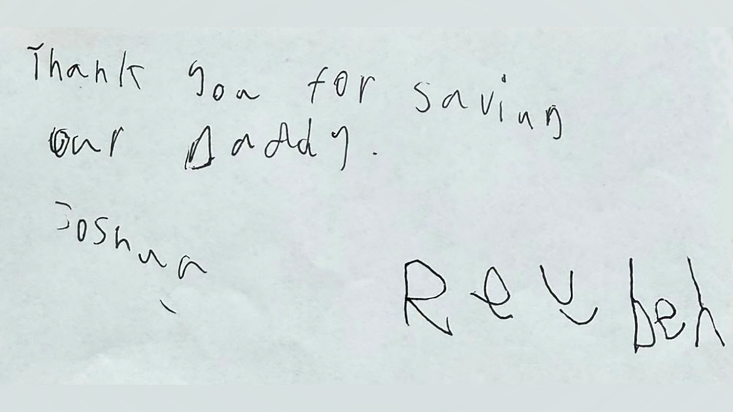 A handwritten thank you message, written by Andy’s young children
