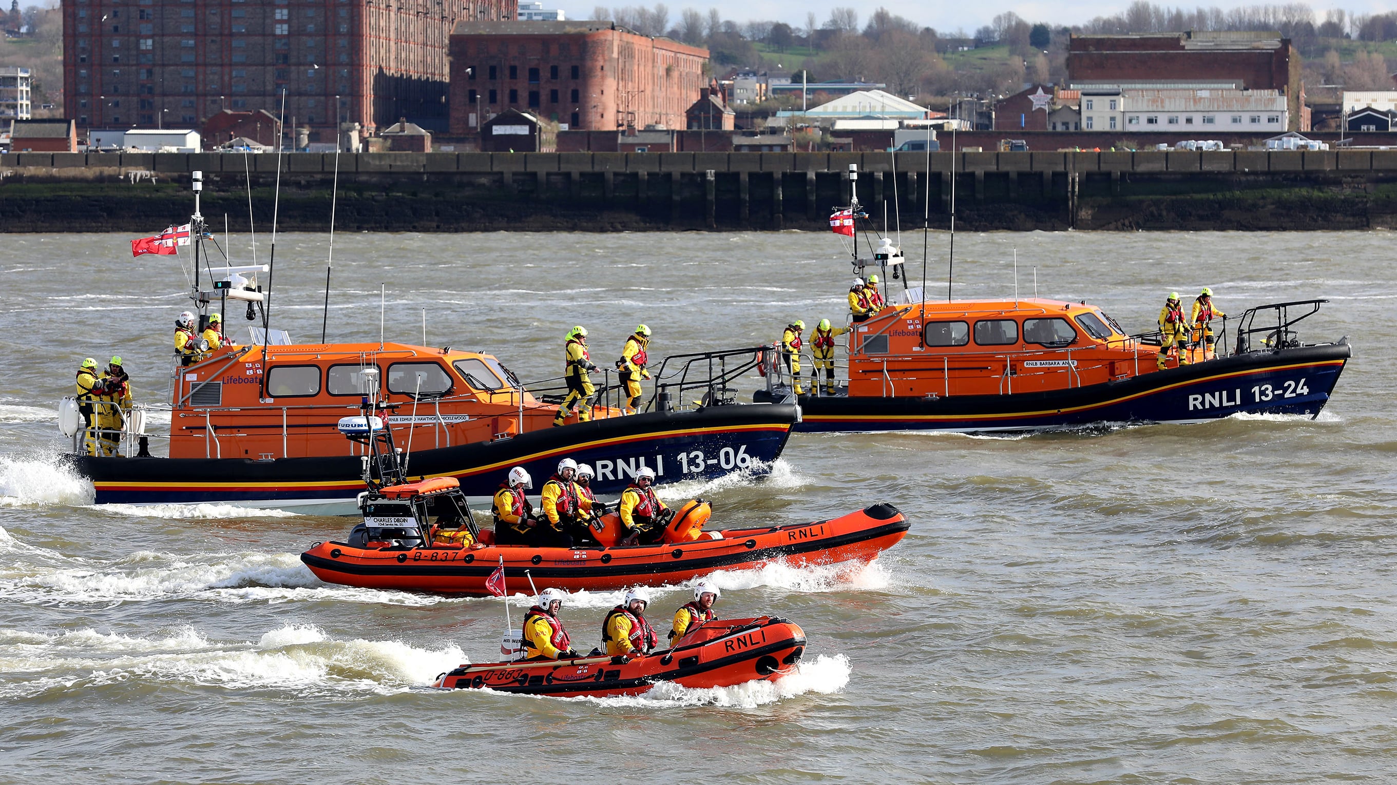 A flotilla of lifeboats, with two Shannon class lifeboats, a B class lifeboat and a D class lifeboat. Photo: Nicholas Leach.