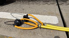 Headphone like attachments at the end of hoses.