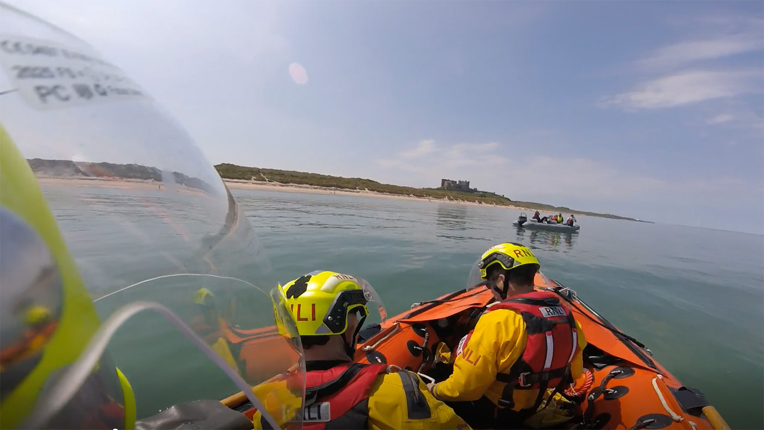 The Seahouses crew launch to people on a broken-down boat.