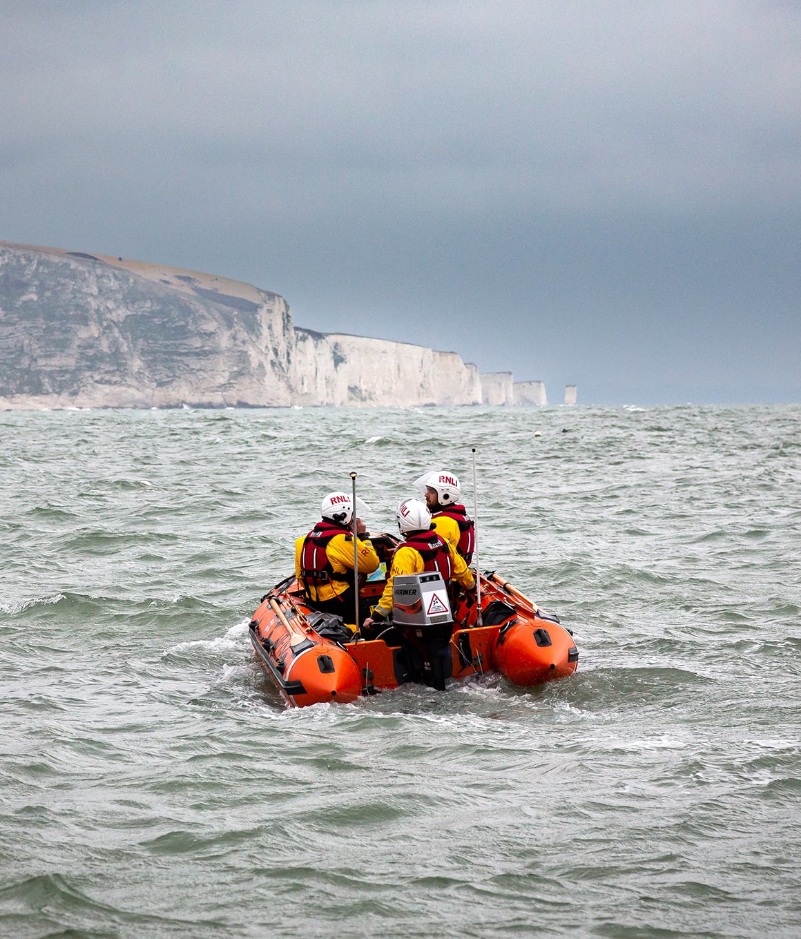 Swanage RNLI's D class inshore lifeboat being launched on a training exercise.
