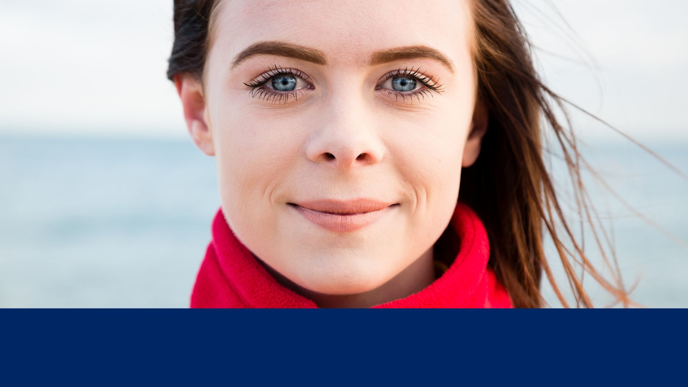 Close up portrait on female lifeguard looking straight to camera