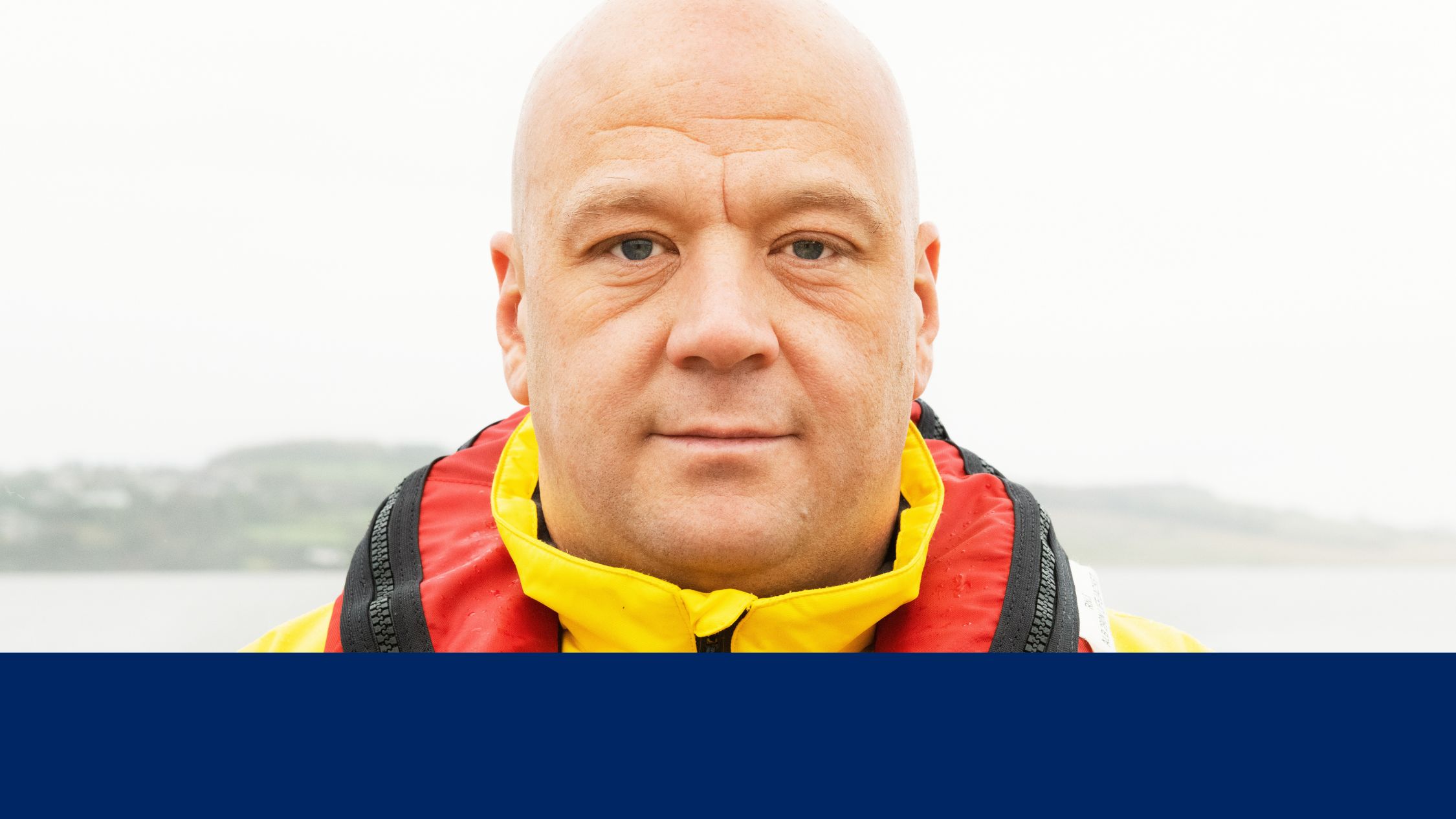 Close up portrait on male crew member looking straight to camera