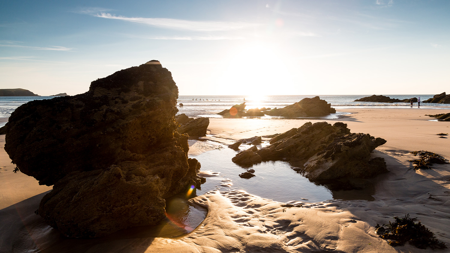 Rocks and rock pools on a sandy beach
