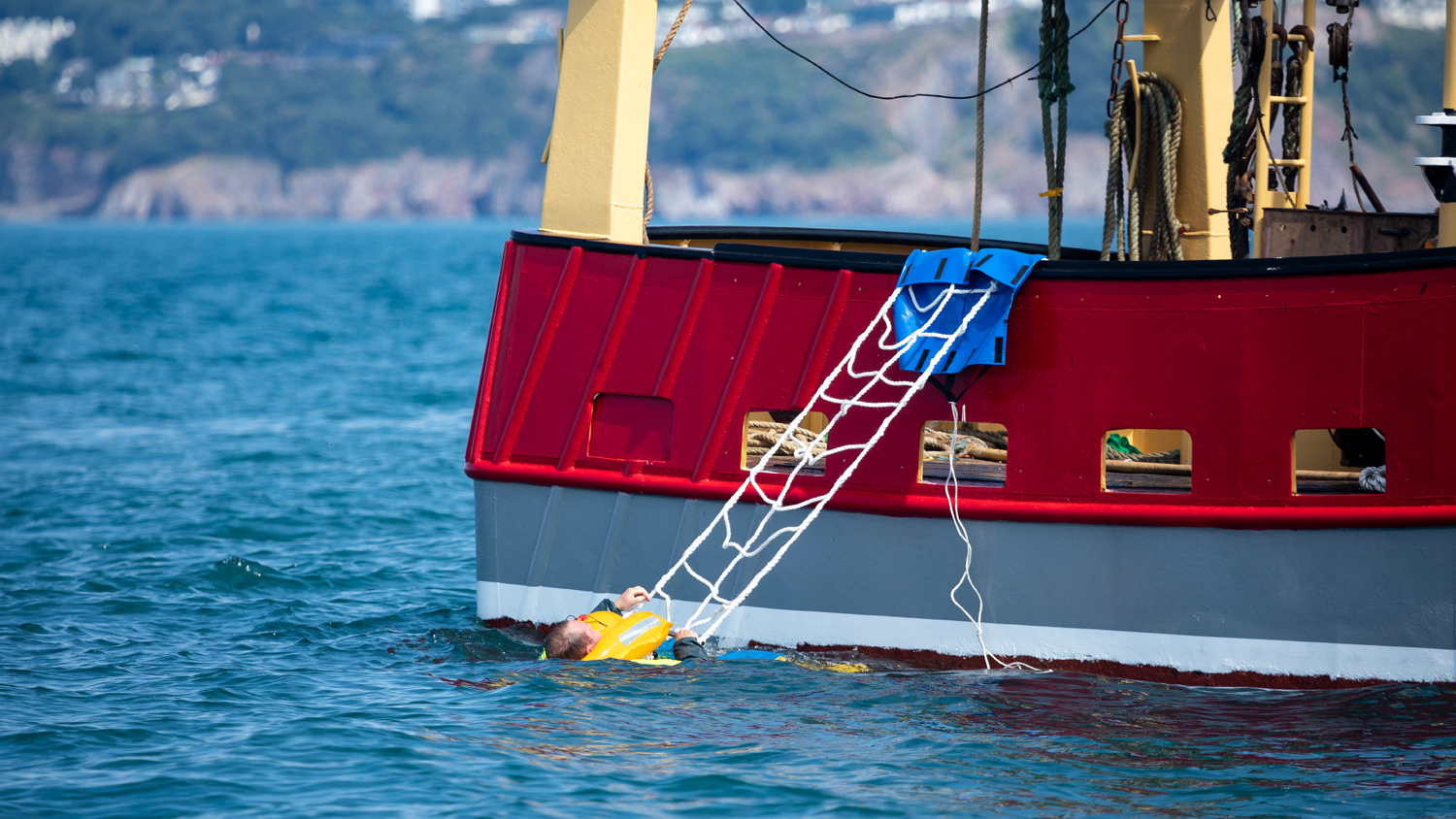 A commercial fishing vessel with an A-frame