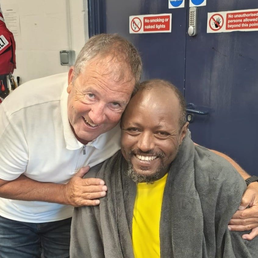 Samuel Kassu with shore crew Bob Morgan
