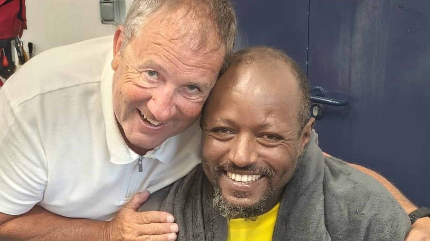 Samuel Kassu with shore crew Bob Morgan