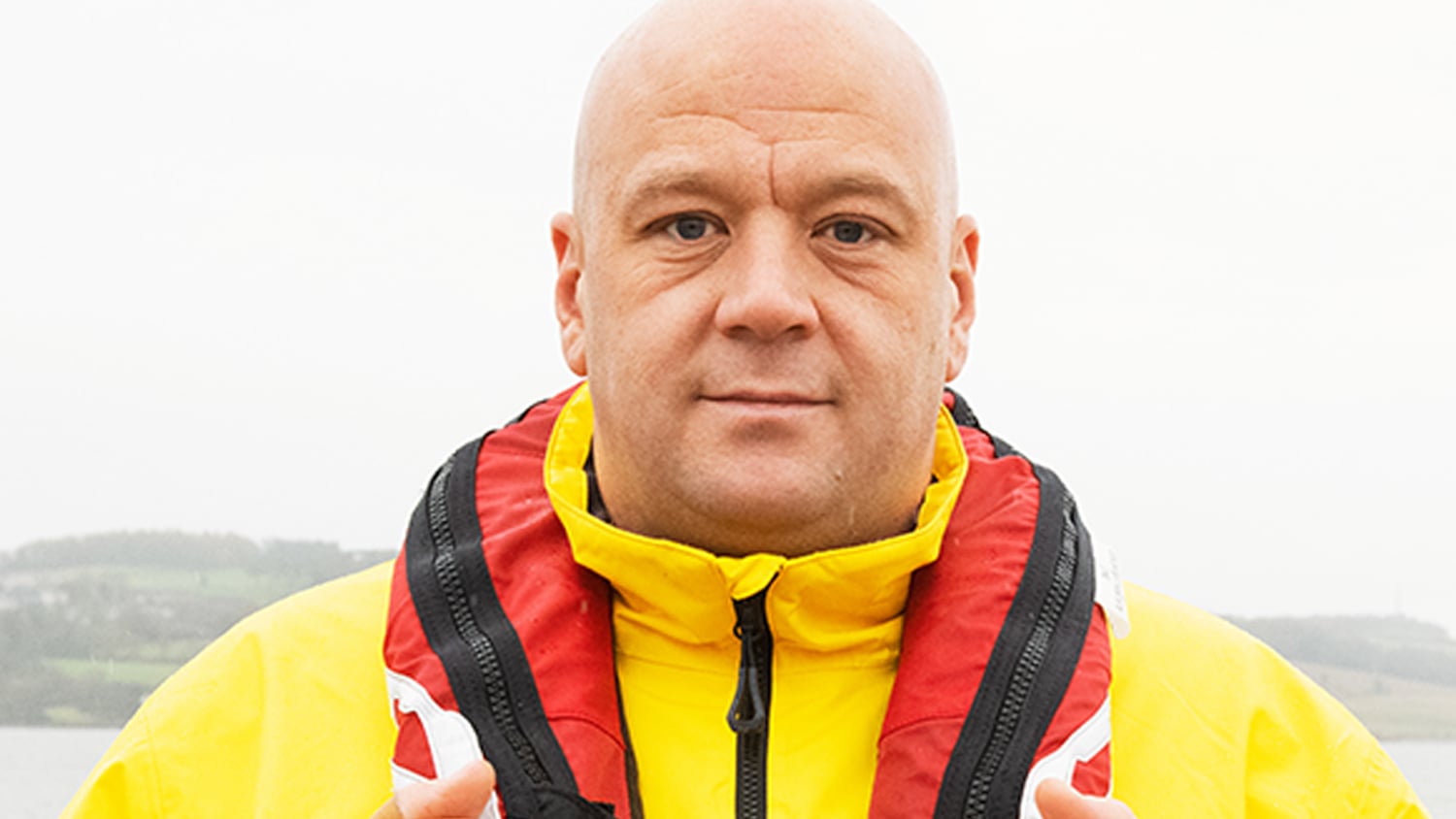 A portrait of Benny Thomson, Volunteer Crew Member at Broughty Ferry RNLI. He is wearing crew kit.