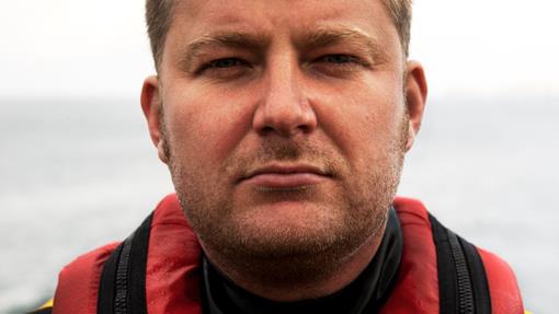 A head-and-shoulders photo of Port Isaac RNLI Helm Damien Bolton