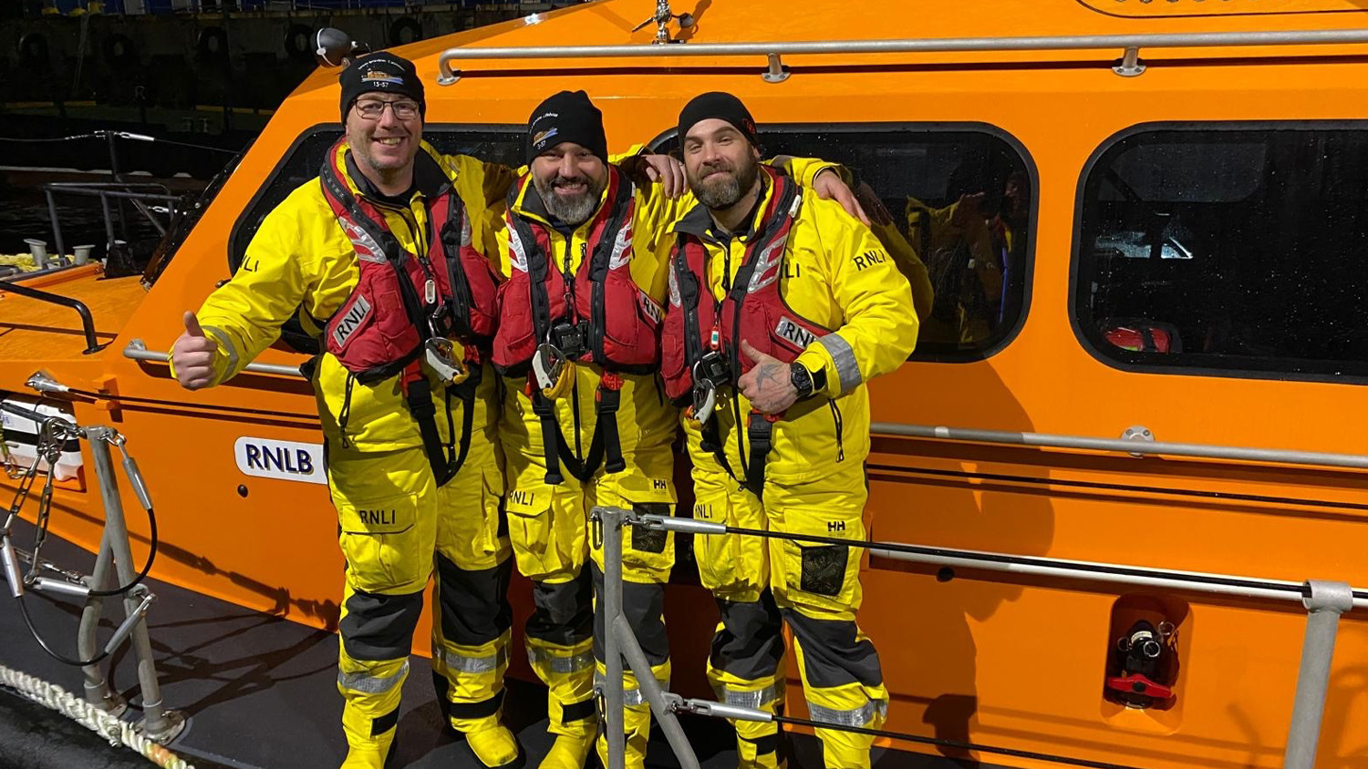 Newly trained Invergordon Crew Members Lee Falkiner, Danny Simpson and Andy Haines looking very happy in their crew kit aboard the station’s Shannon class lifeboat