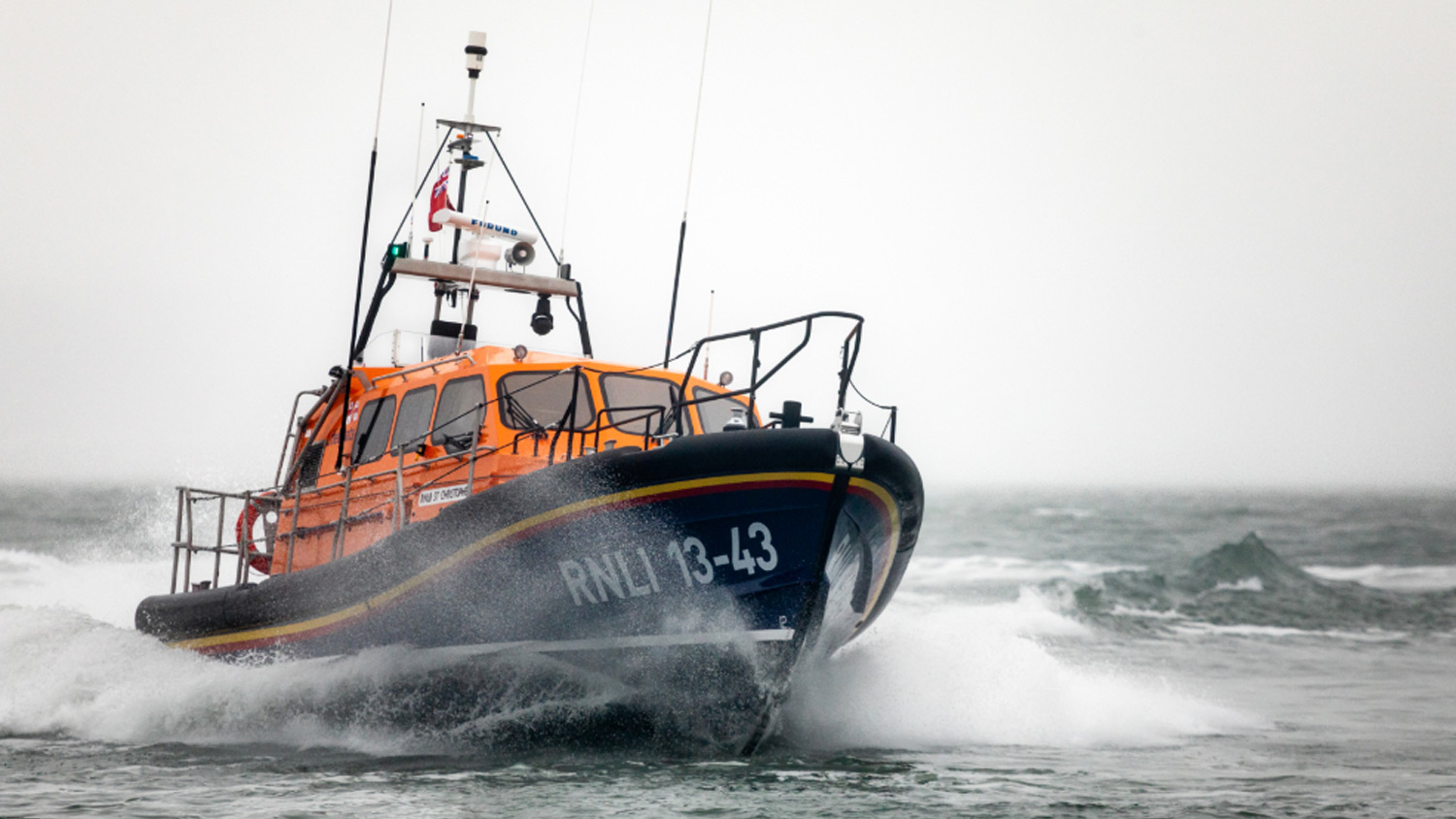 Clifden’s Launch a Memory all-weather Shannon class lifeboat cruises through choppy seas under grey skies
