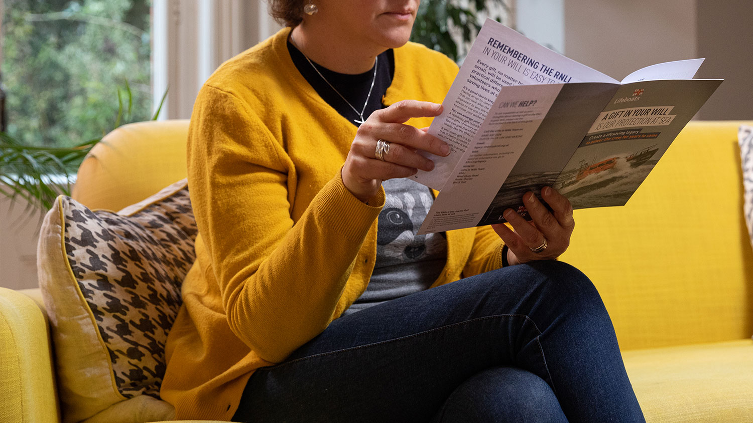 Lady reading gift in wills pack