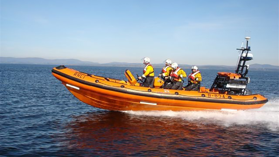 Bundoran’s B class lifeboat powers out to sea, with four crew members aboard