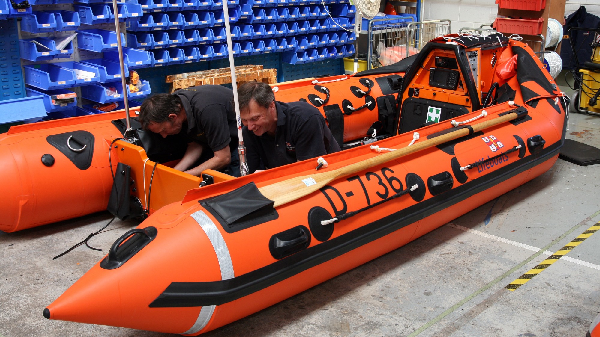 Installing electrics on a D class Atlantic lifeboat at the Inshore Lifeboat Centre