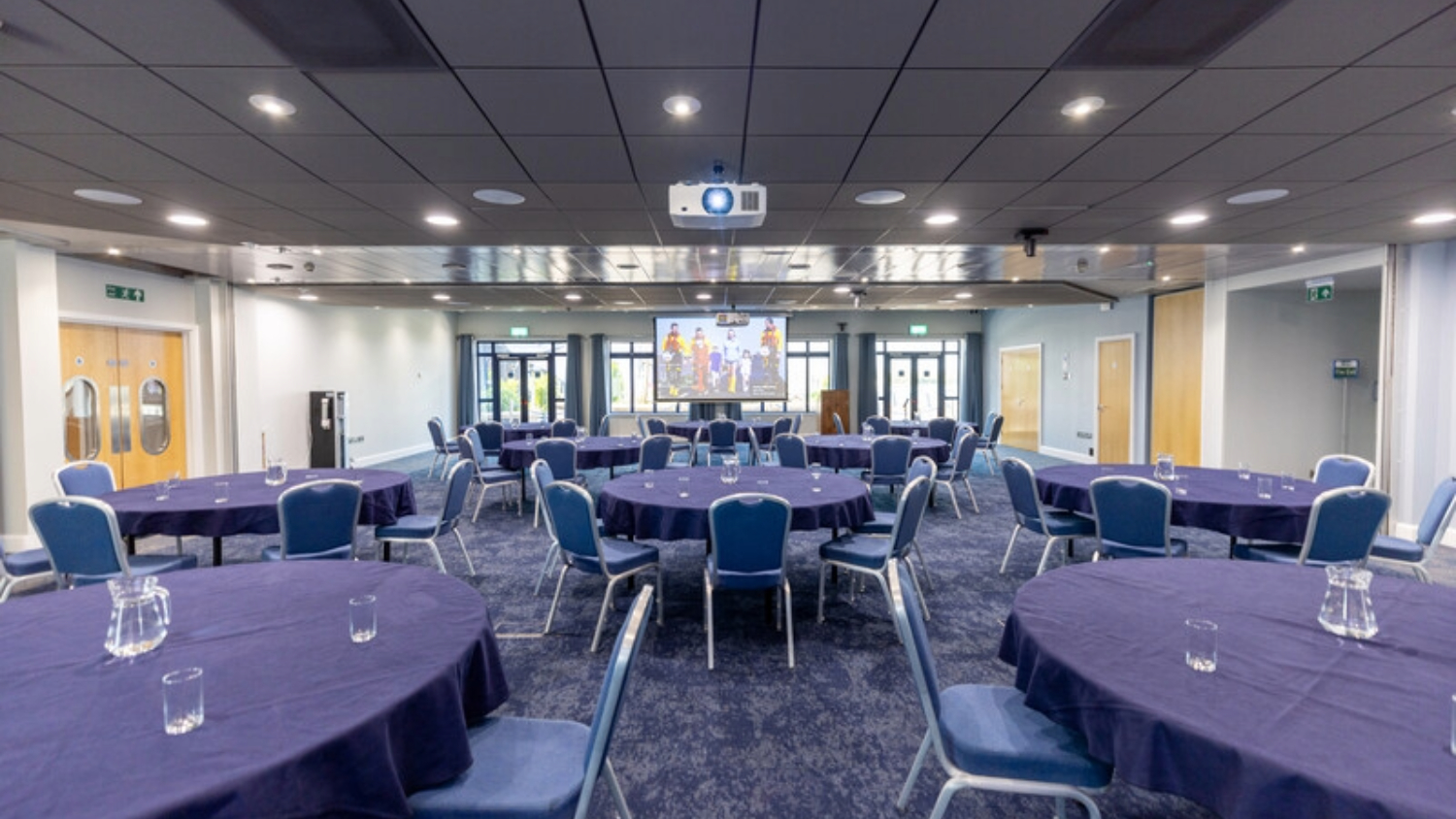 Tables in round table set up at the RNLI College