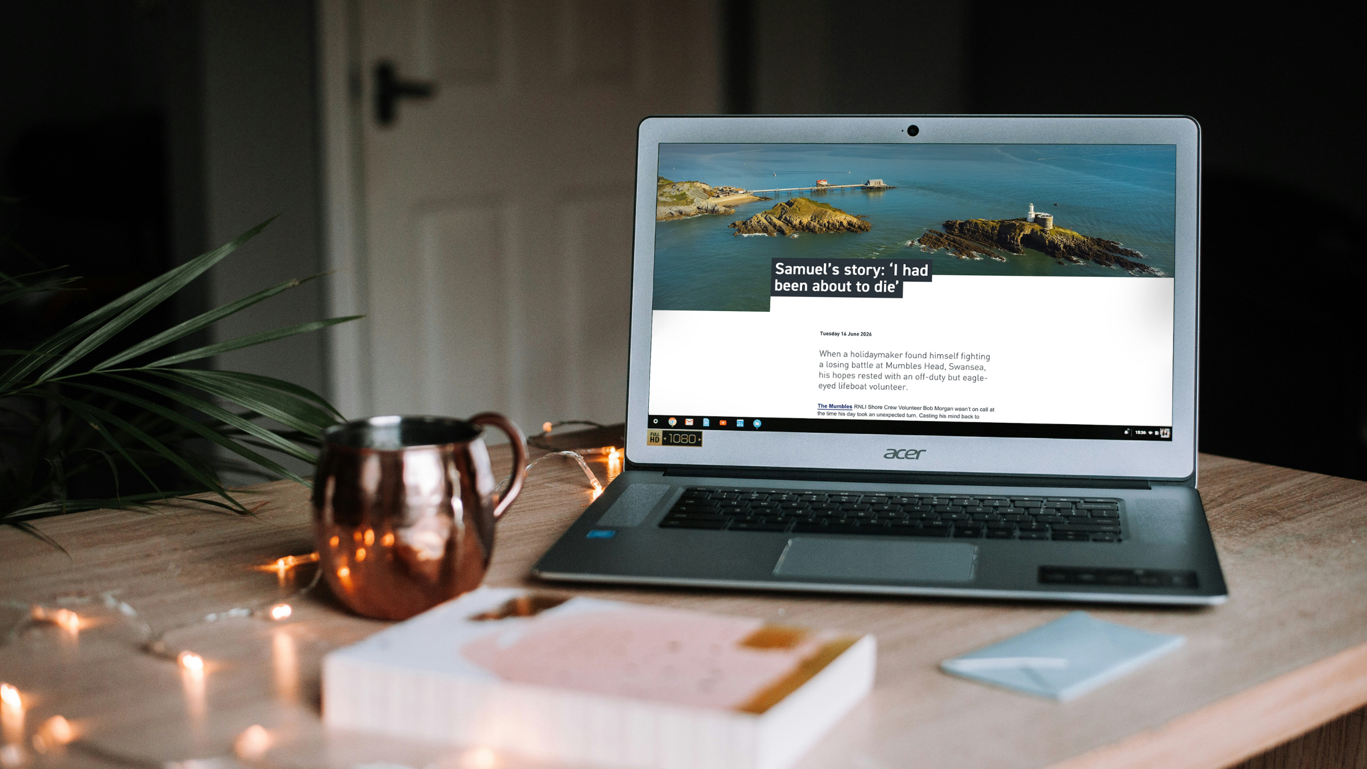 A laptop displaying an RNLI article featuring a real-life rescue story.