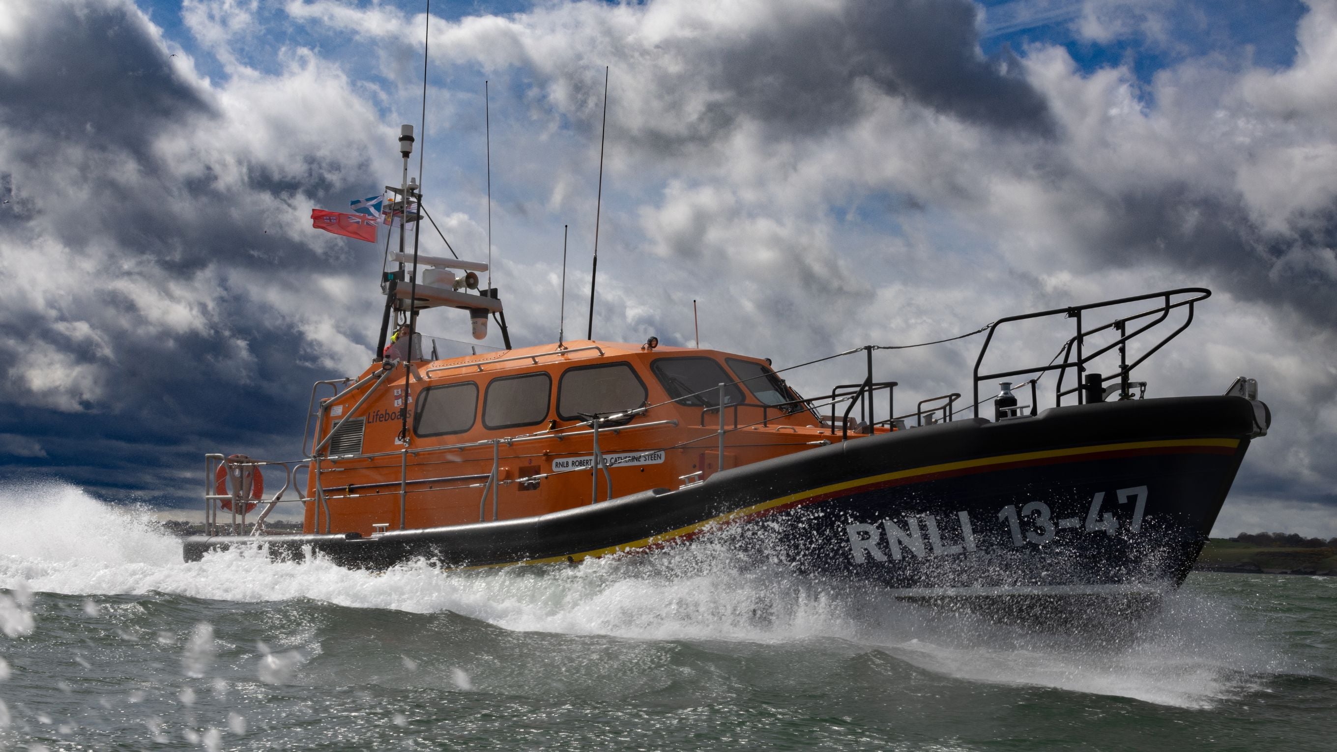 A Shannon class lifeboat sailing through the water.